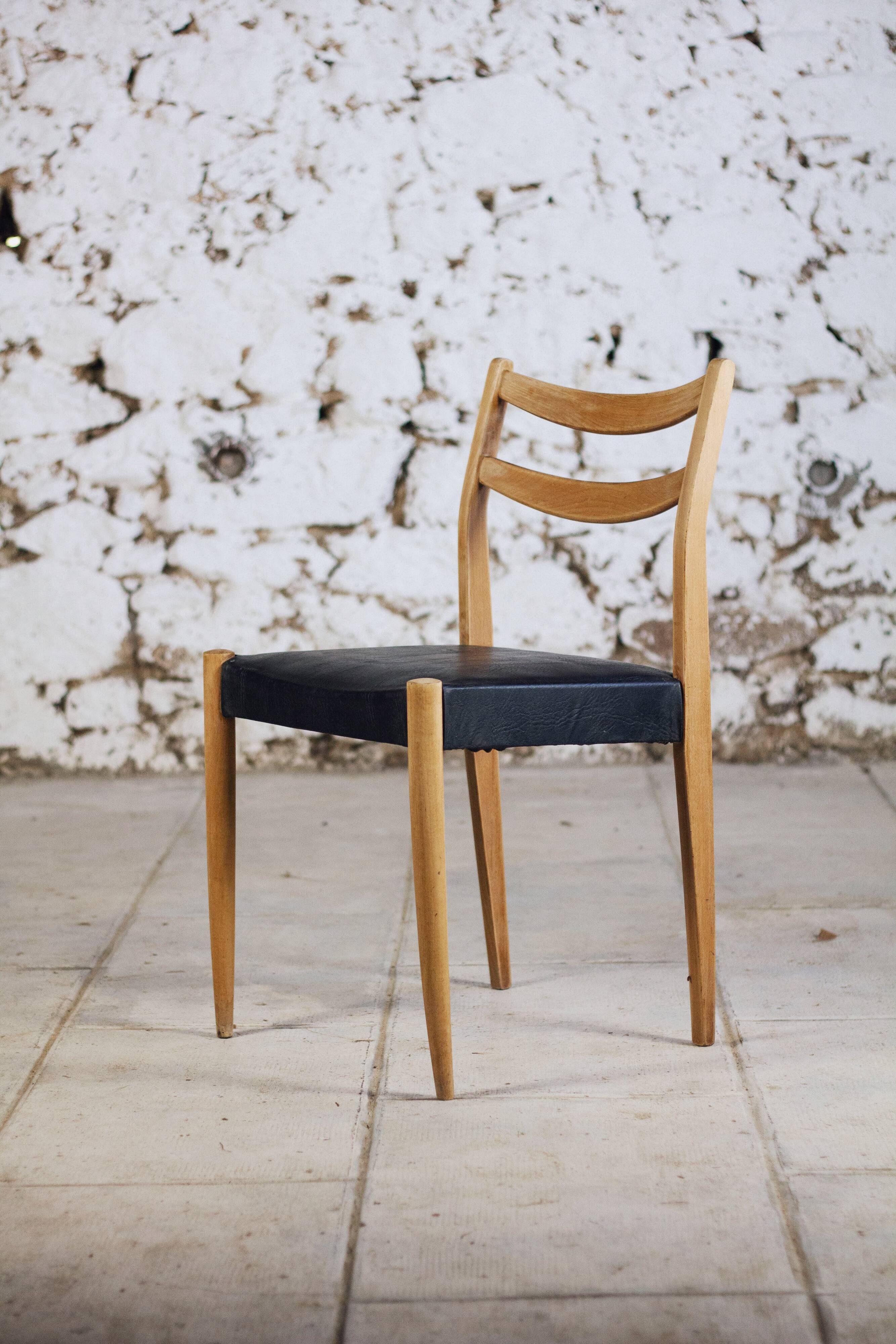 Scandinavian chair in teak and faux leather, 1960.