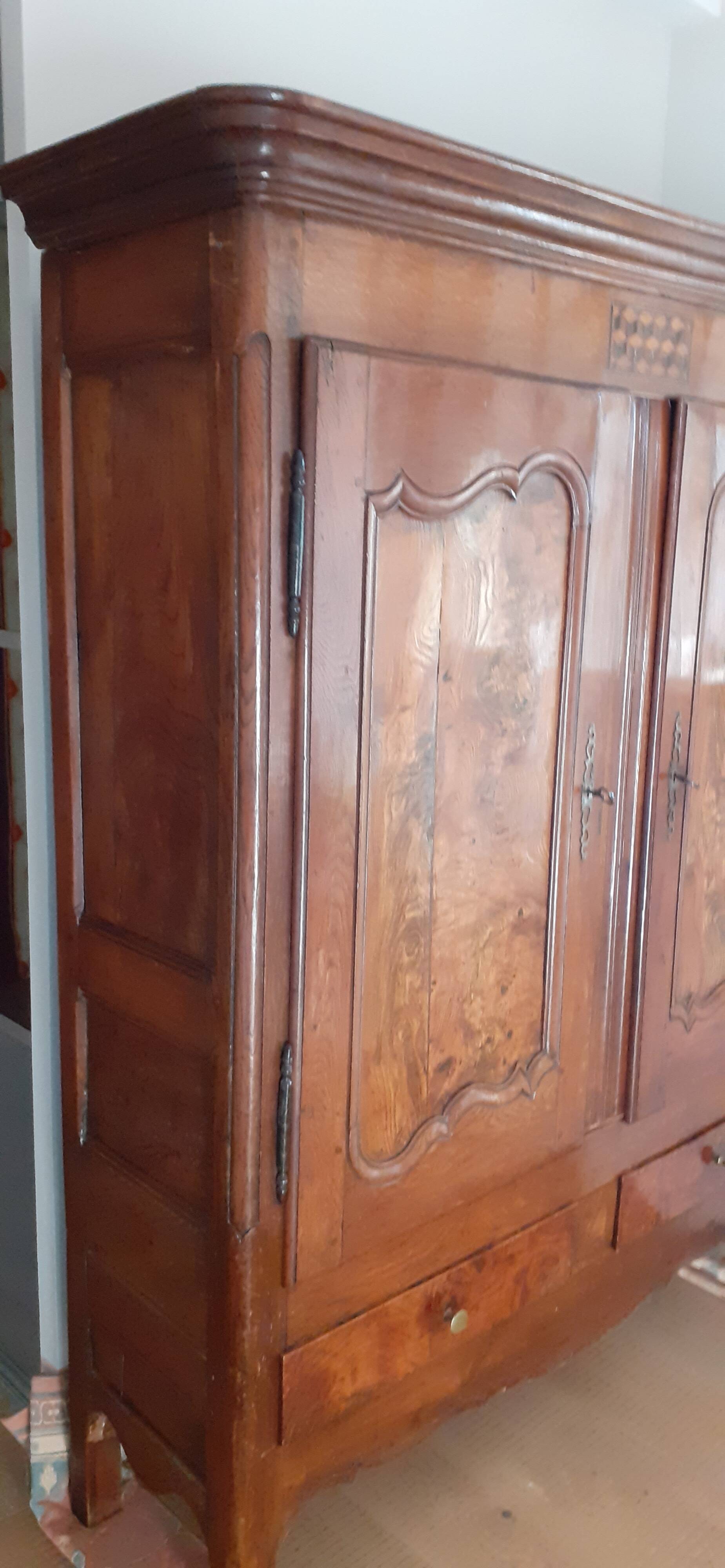 Antique cabinet with elm burrolled doors