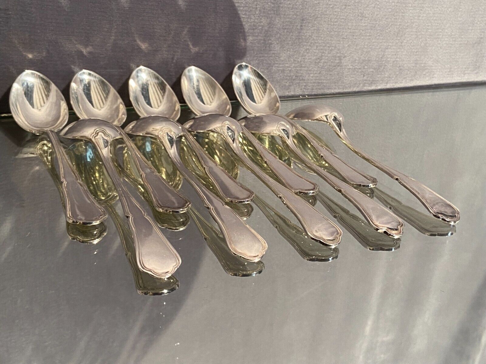 Suite of 10 teaspoons in silver metal model violin net Louis XV