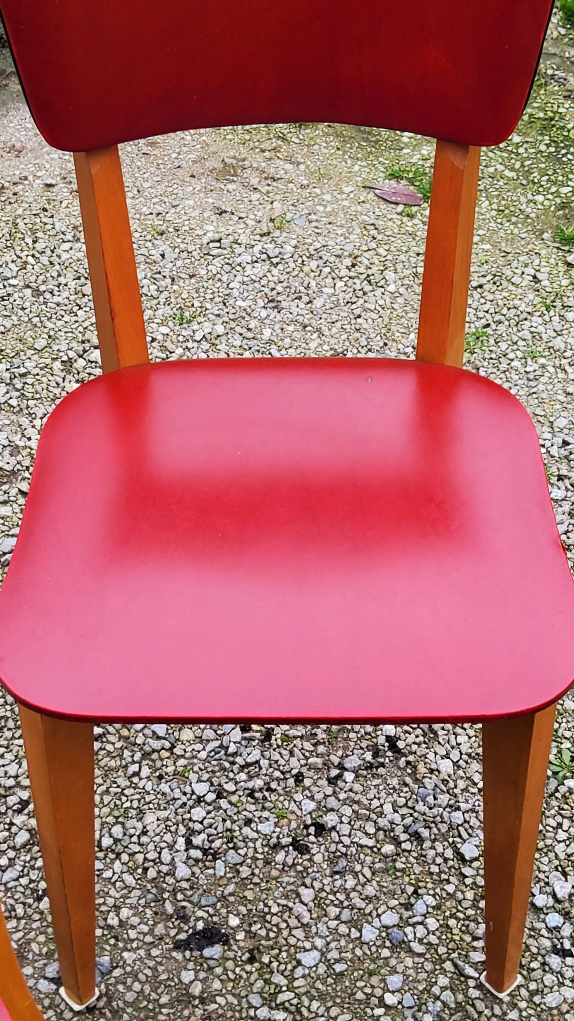 Set of 4 vintage chairs from the 50s in blond beech and red leatherette