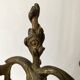 Pair of antique bronze candlesticks at the end of the table XIXth