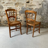 Set of 2 antique wooden and straw chairs.