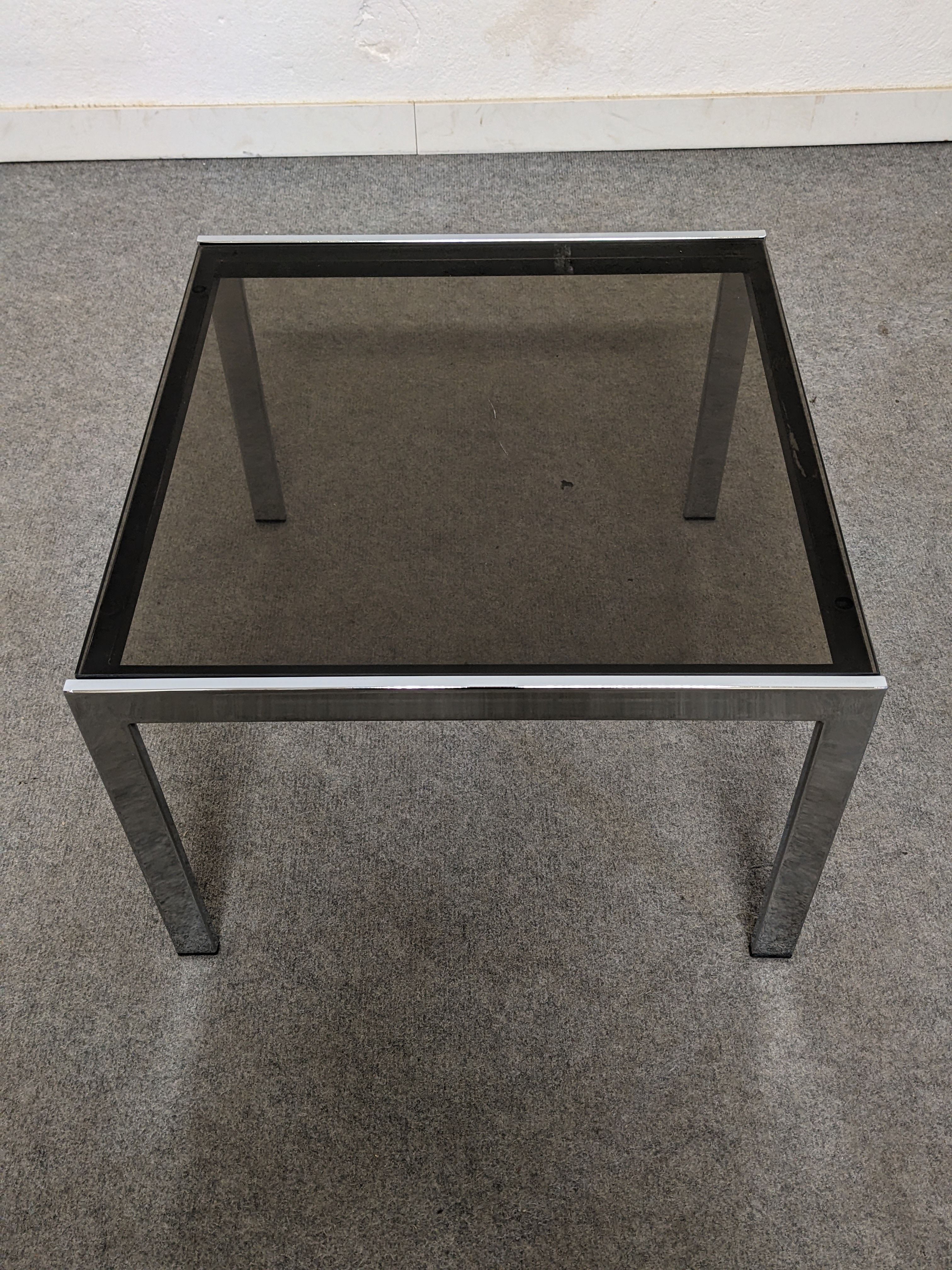 Bedside table or end of sofa in chromed metal and smoked glass from the 70s