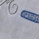 Drap 1 place brodé YM ruban noué bleu
