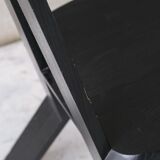 Set of six black dining chairs