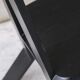 Set of six black dining chairs