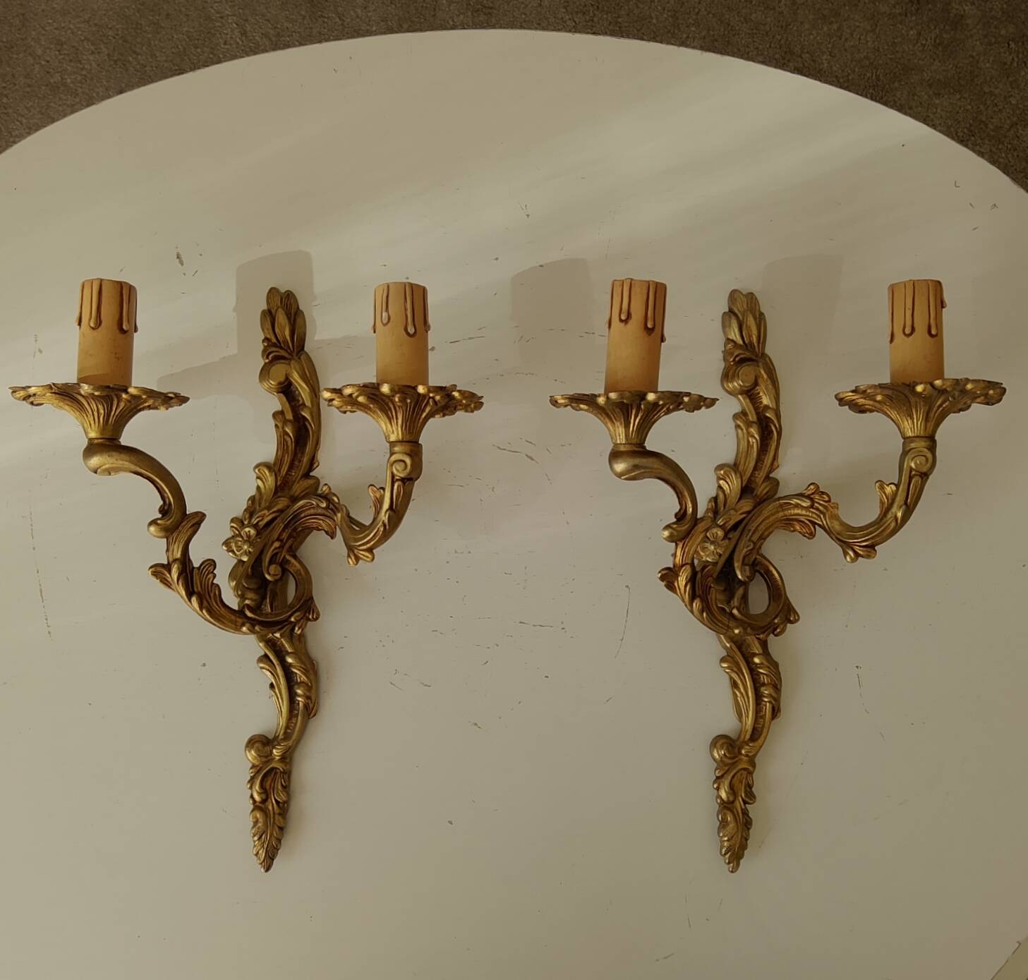 Pair of antique Rococo wall sconces in Louis XV style.