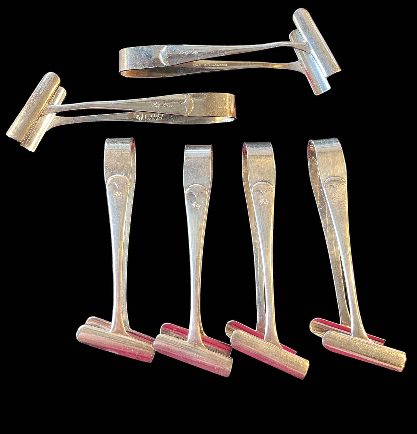 6 asparagus tongs from the Ritz Hotel