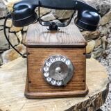 Old wooden dial crank telephone
