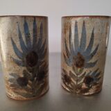 Two vases rolls decorated with thistles, signed