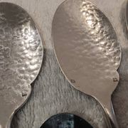 6 individual silver-plated metal sauce spoons with hammered baguette handles