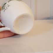 Série de 11 tasses en porcelaine