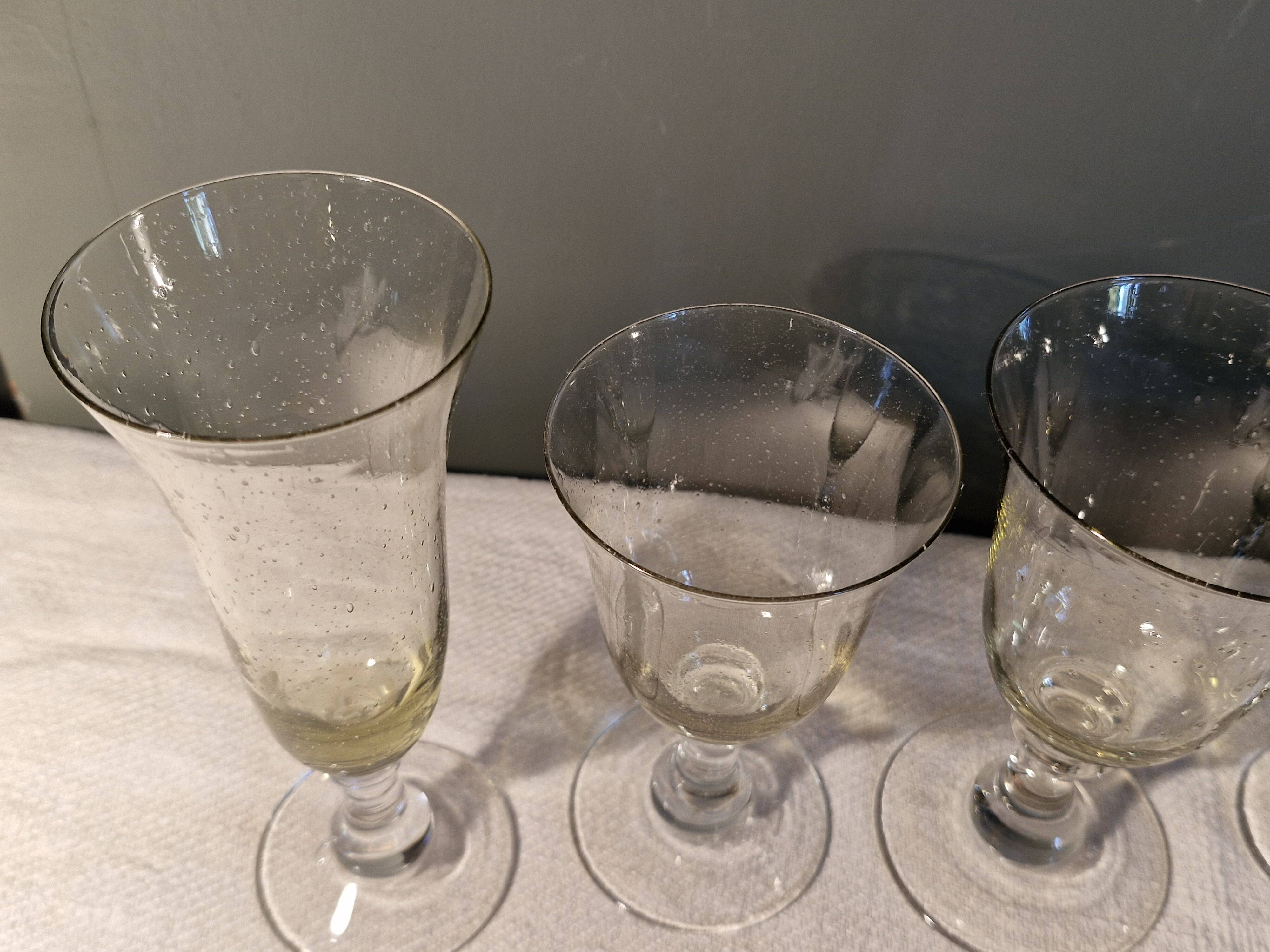 4 old blown glasses, 2 champagne flutes, 2 glasses