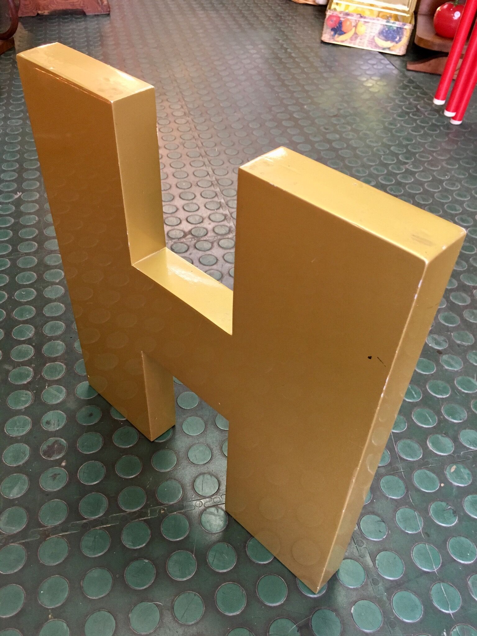 Golden sign letter h