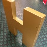 Golden sign letter h