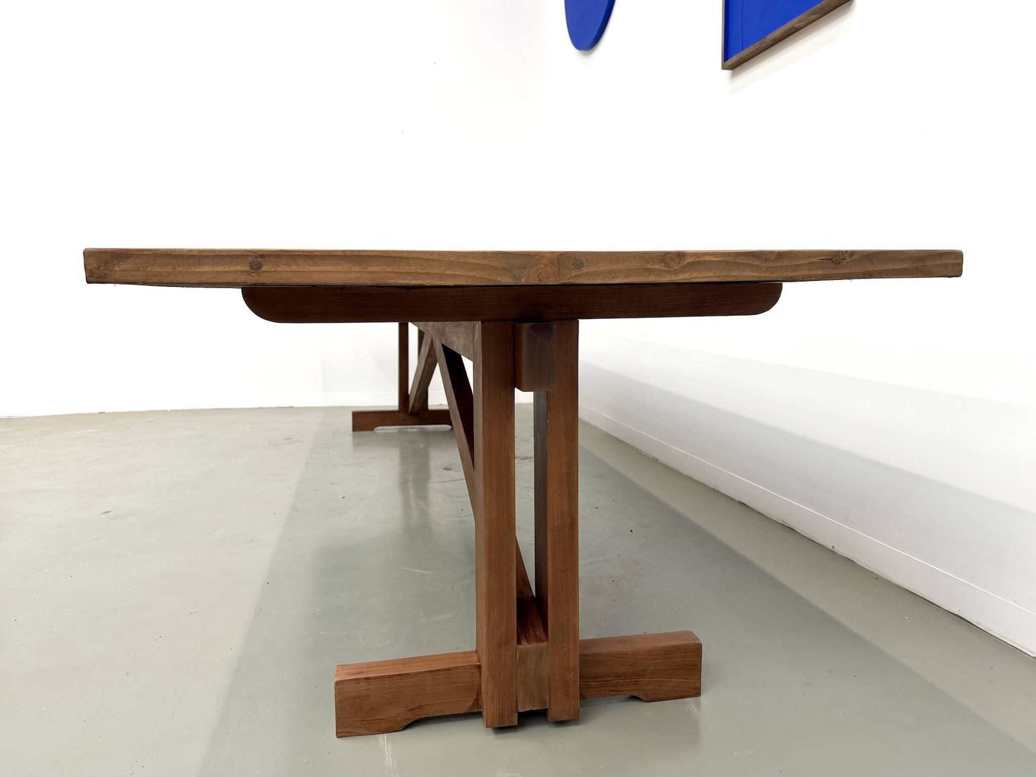 Refectory table in solid pine and beech, with X-shaped legs.