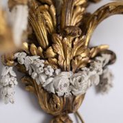 Pair of Louis XVI style wall lights in gilded and lacquered wood. Circa 1900.