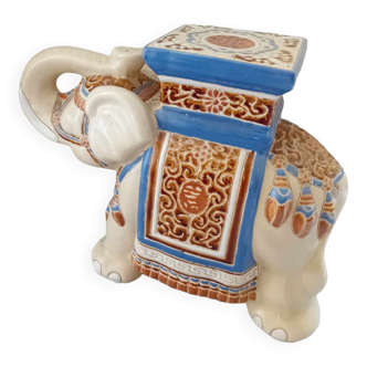 Elephant in glazed earthenware for use at the end of a sofa