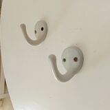 Antique enamelled cast iron wall hook from the 30s/40s