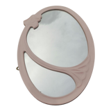 Oval mirror in pink cast iron layette