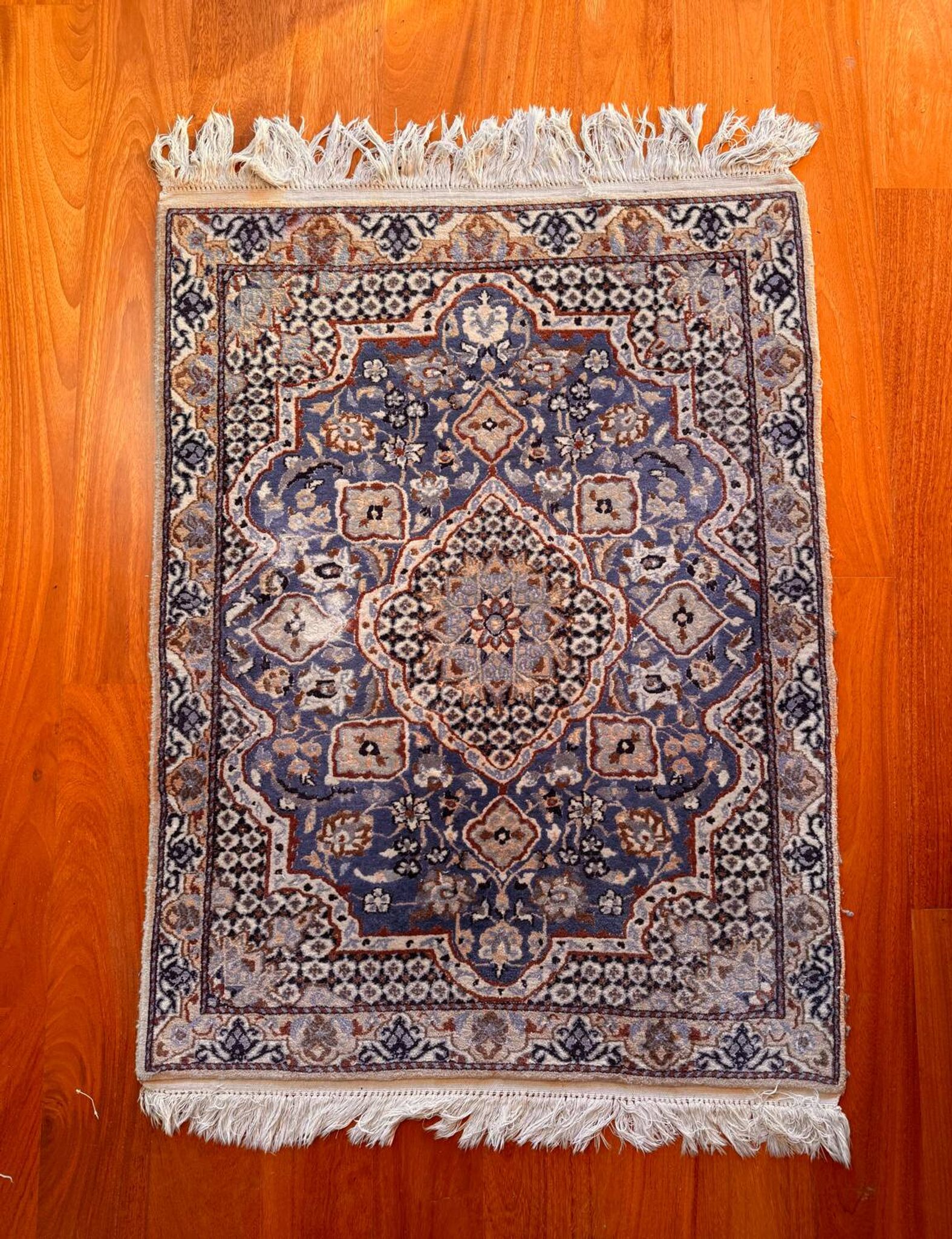 Persian Nain carpet made of wool and silk