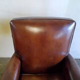 Club armchairs with curved backs
