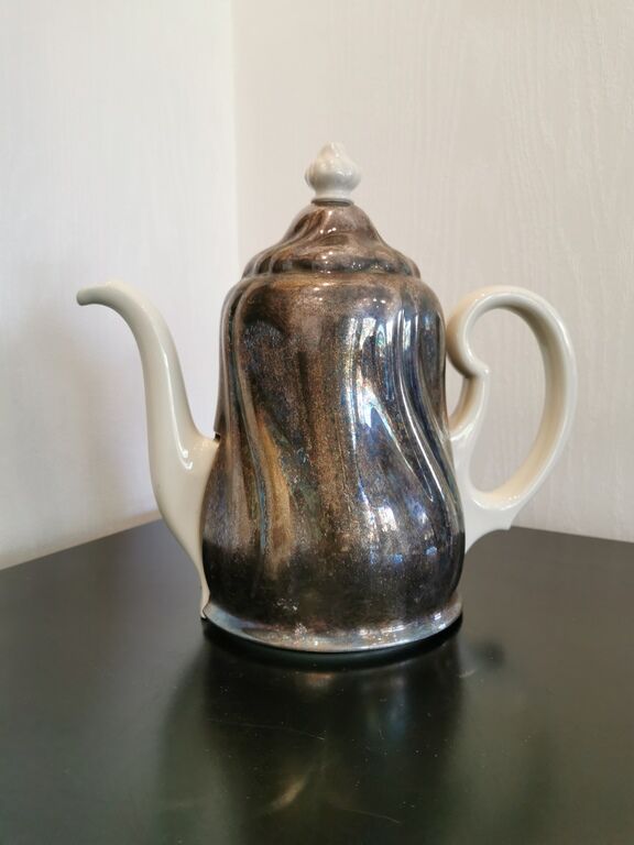 Silver-plated ceramic jug