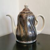 Silver-plated ceramic jug