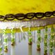 Antique Art Deco lampshade in yellow marbled glass with bead fringes.