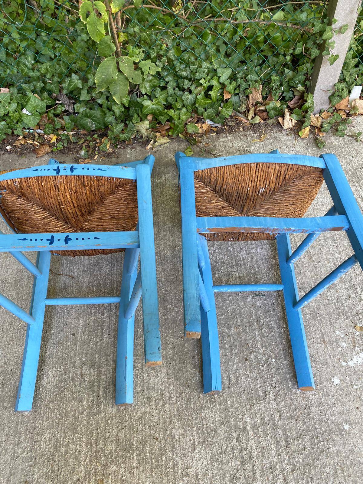 2 solid wood chairs in blue straw