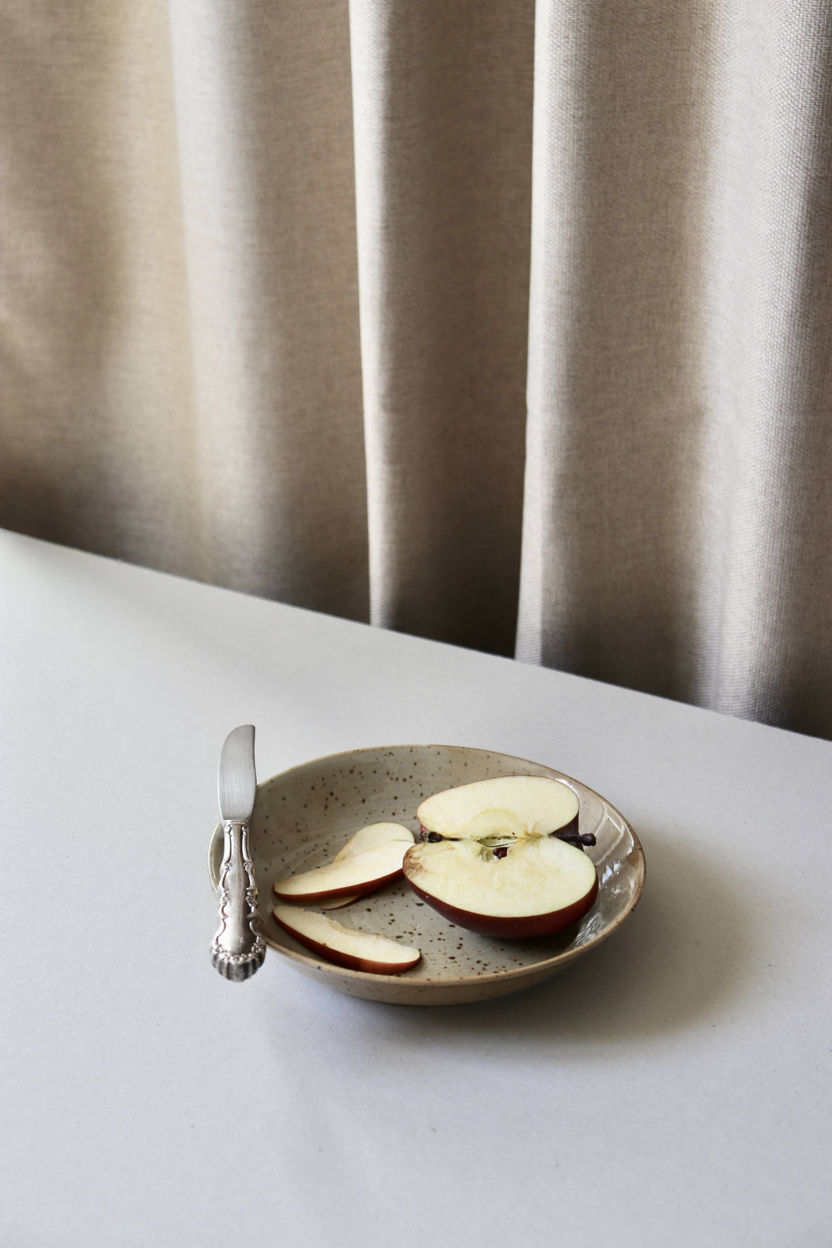 7 speckled stoneware plates