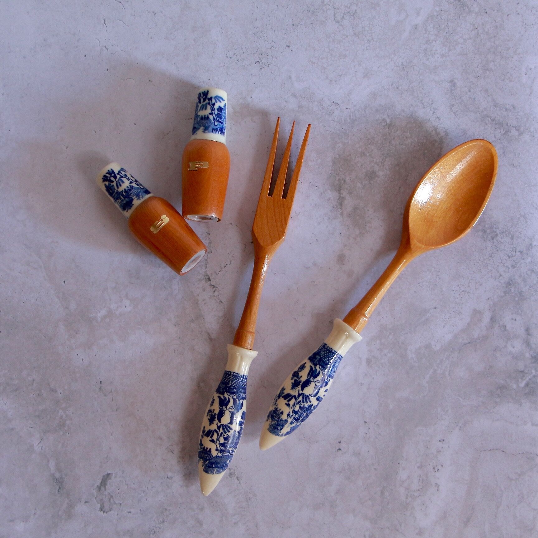 Set of wooden and ceramic salad cutlery
