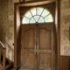 Old wrought iron full riveted gates from the 19th century.