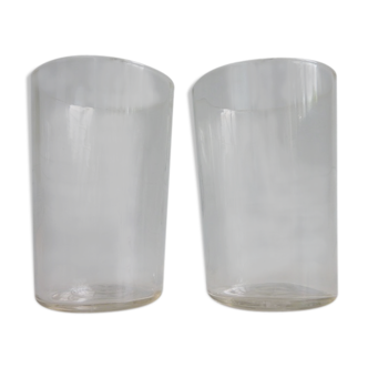 2 old-faceted glasses