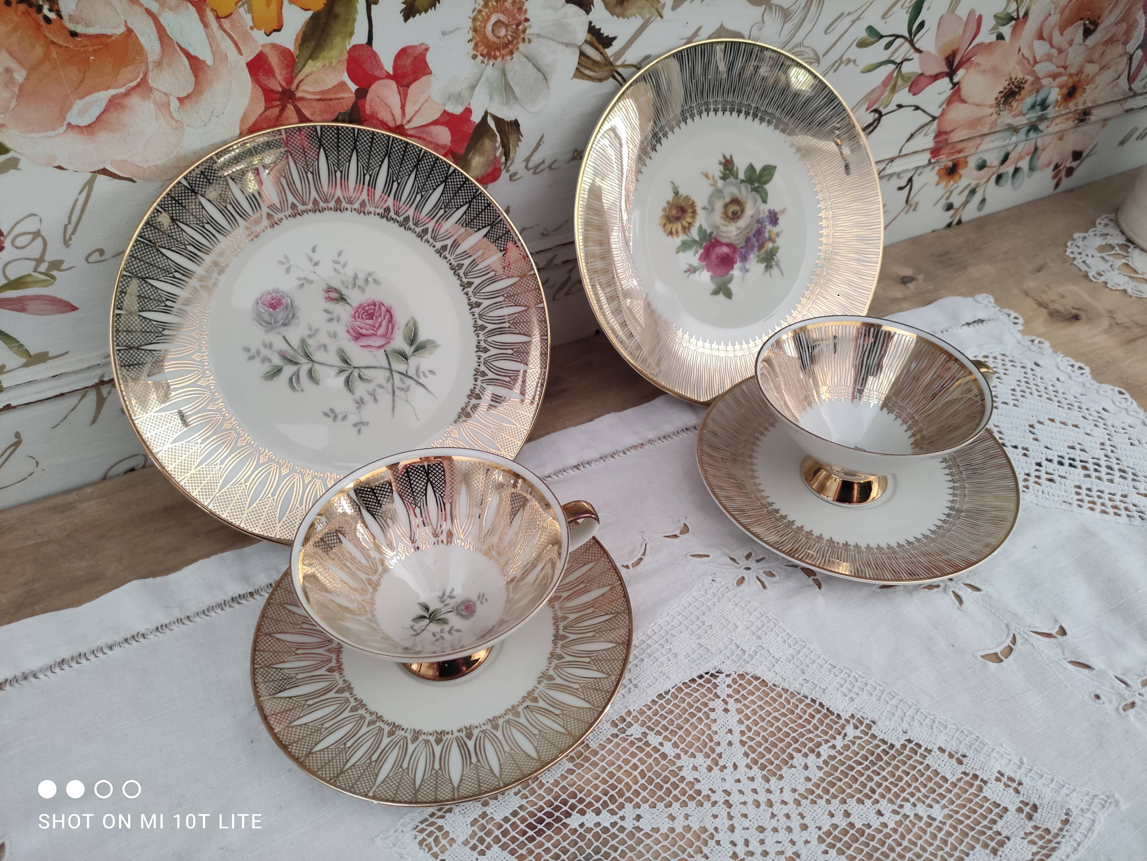 Head to head in porcelain Bavaria 6 pieces floral decoration and gilding
