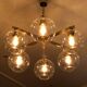 Lustre "Pastoral" en laiton avec six globes Hans-Agne Jakobsson
