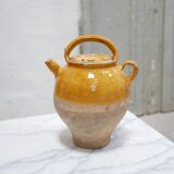 Old gargoulette pot in glazed terracotta