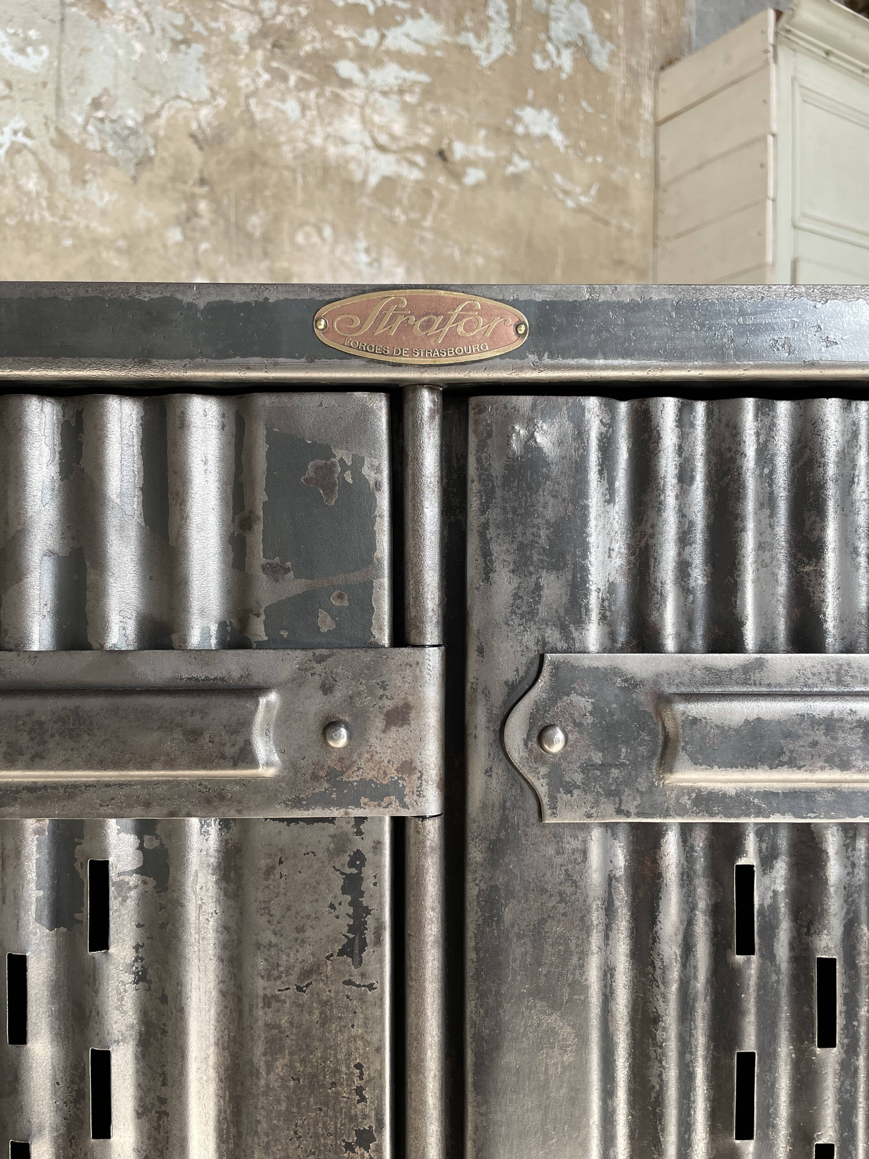 Strafor double-door corrugated iron cloakroom, circa 1920.