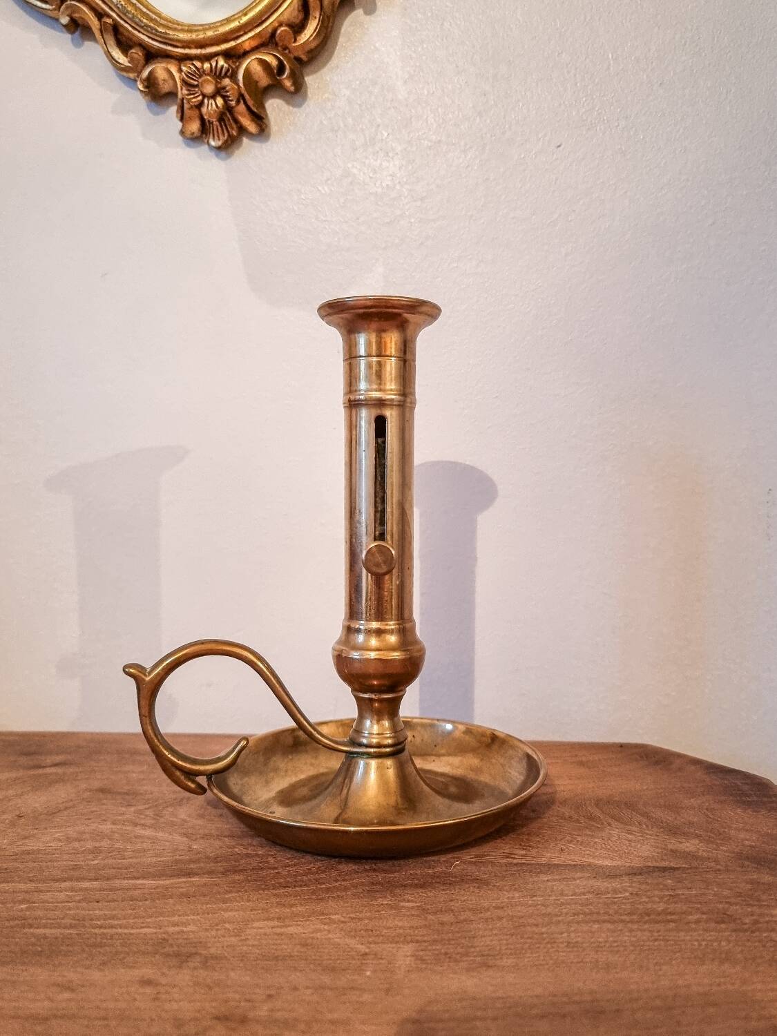 Cellar rat candle holder with brass pusher