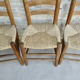 Trio of wooden chairs and mulched seat
