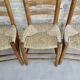 Trio of wooden chairs and mulched seat