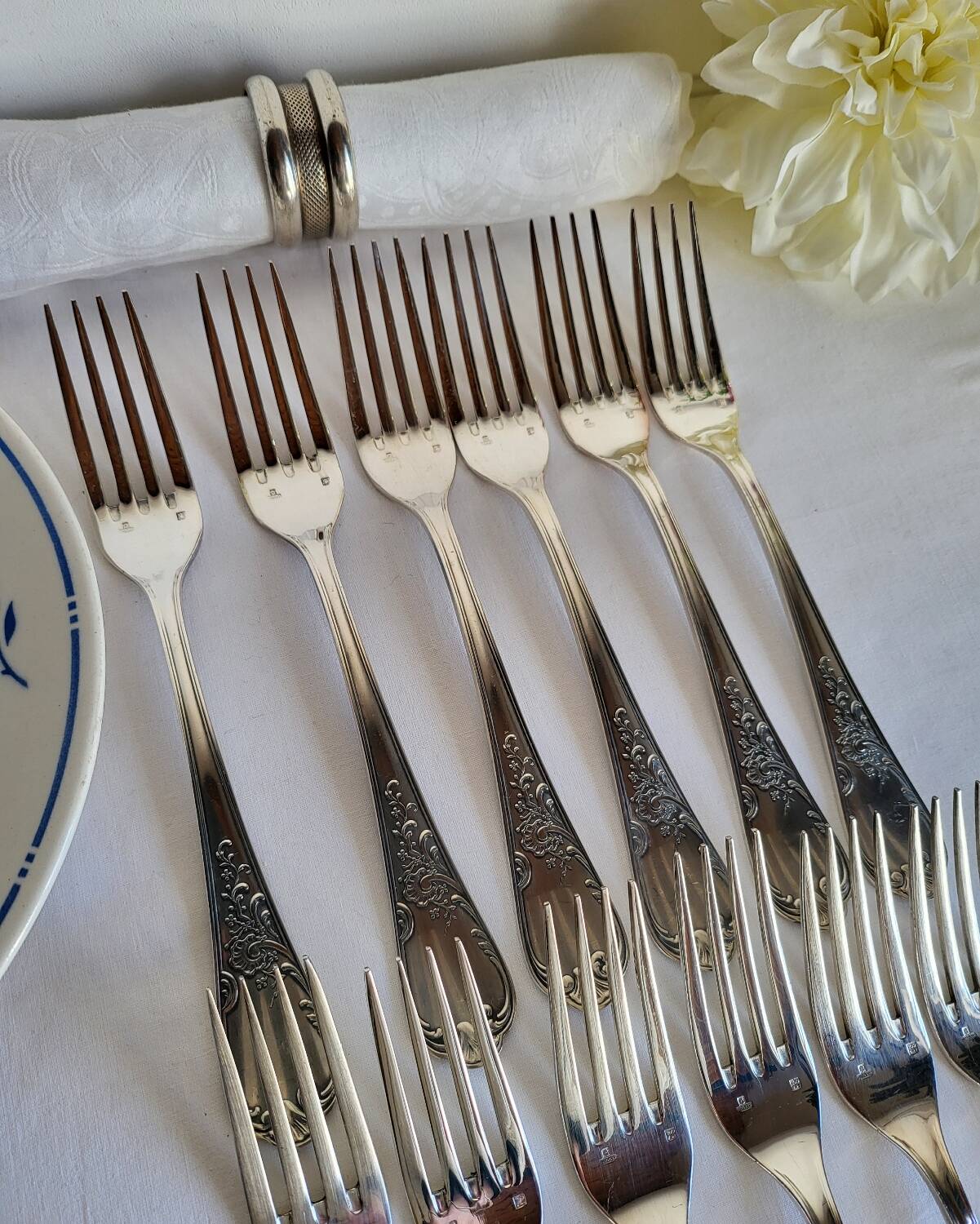 12 large silver-plated metal table forks by Guildart