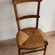 Chaise basse « nourrice » paillée vintage