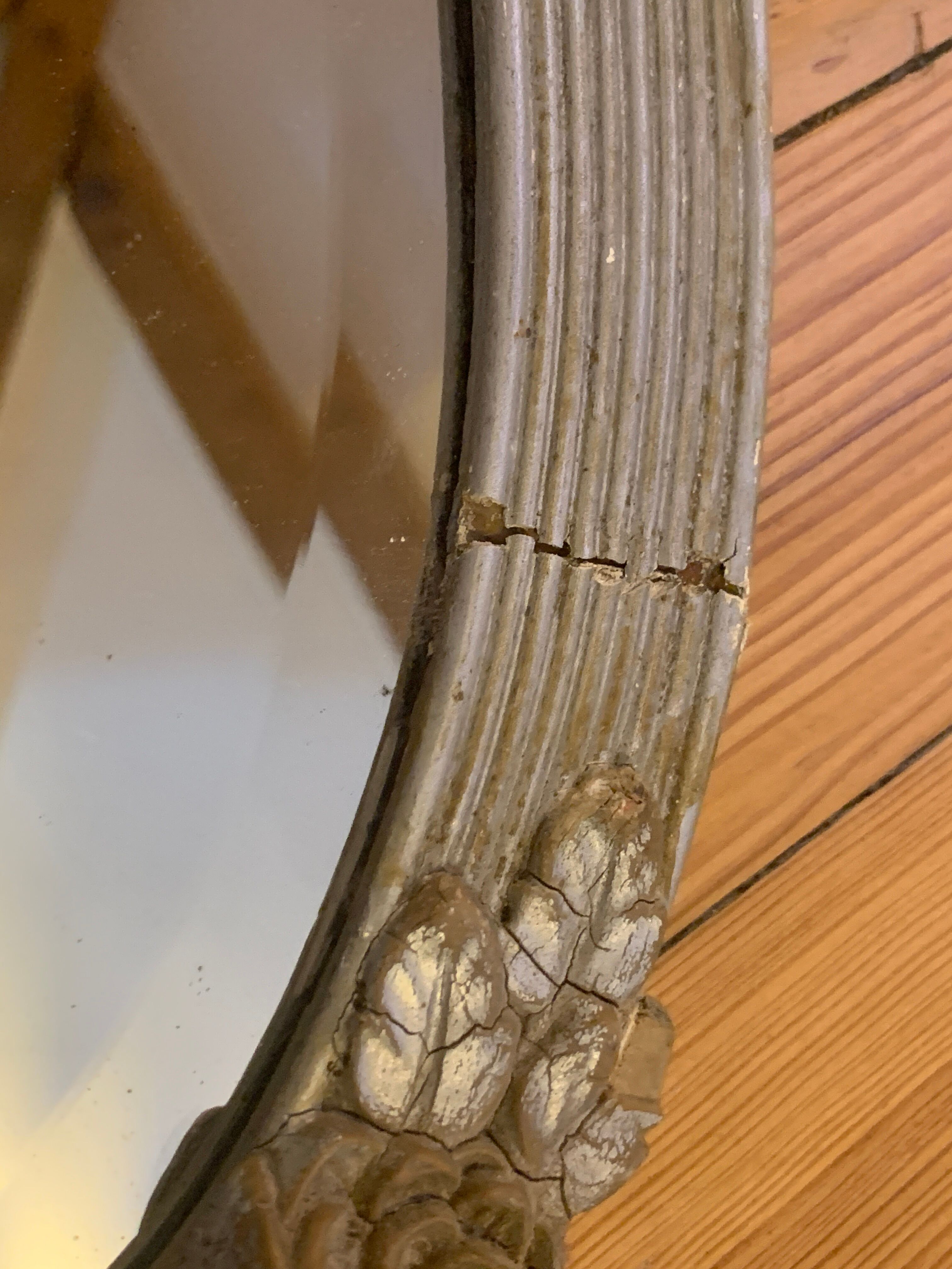 Very old mirror, flower motif frame