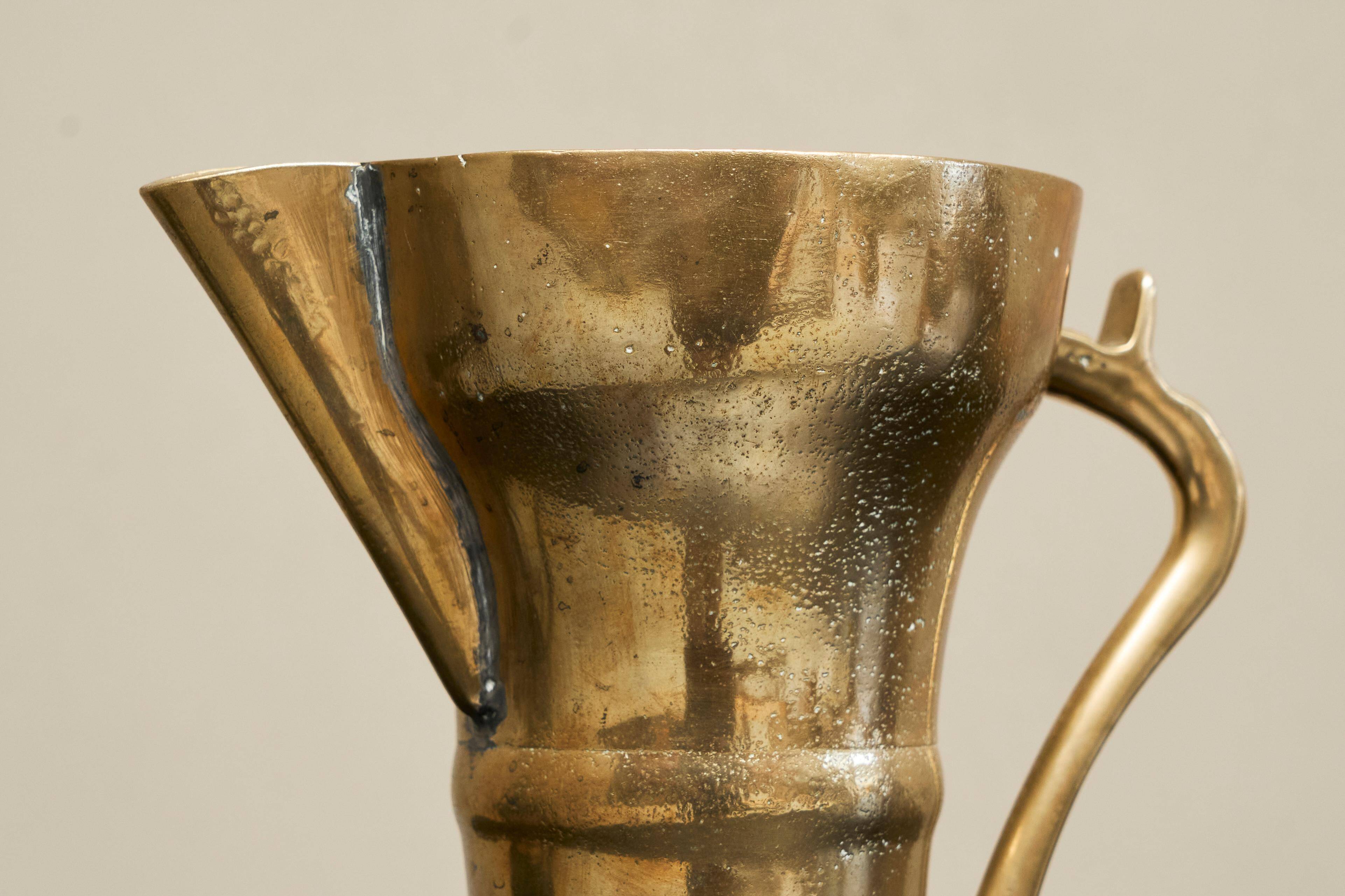 Antique brass jug, 19th century.