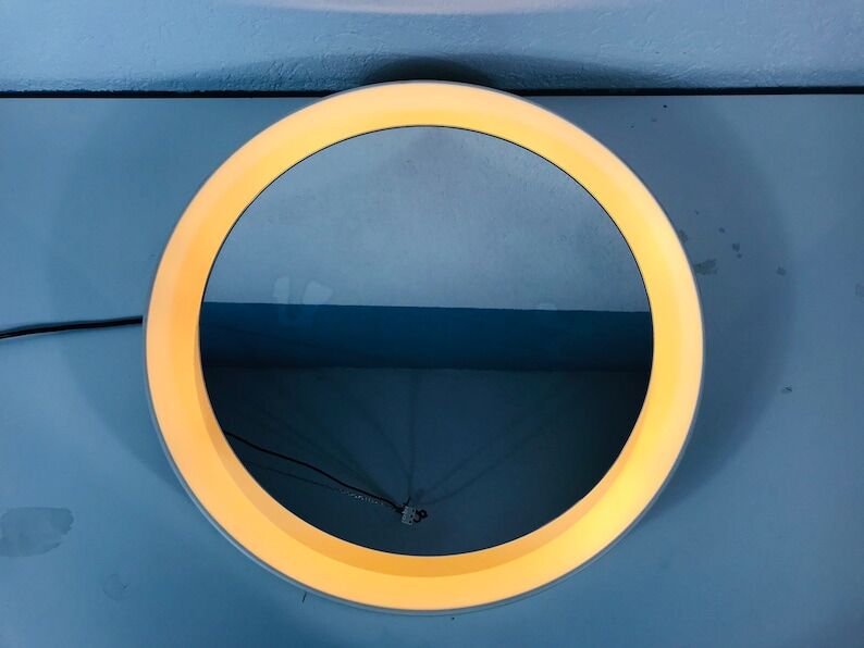 Round illuminated mirror by Schöninger, Germany, 1970s
