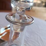 Blown glass decanter, engraved and chiselled. Made in France.