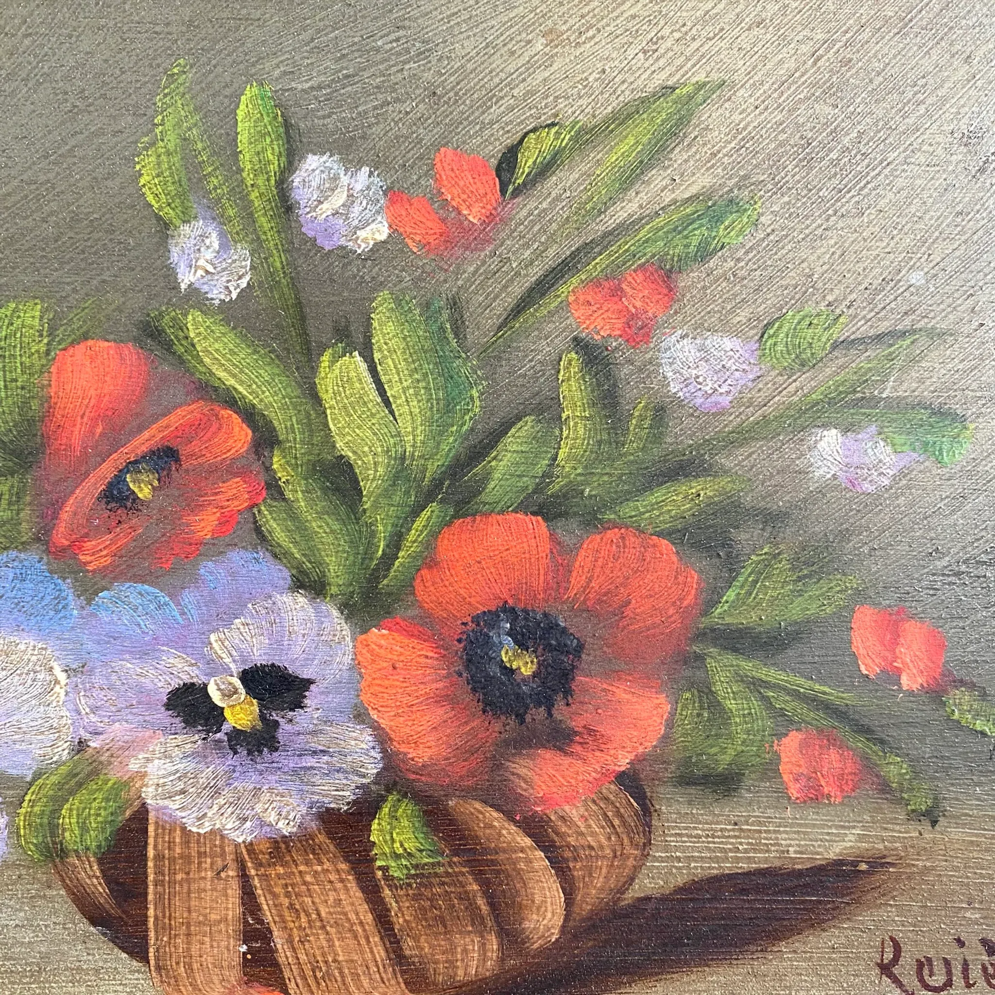Old painting of a bouquet of pansies and poppies.