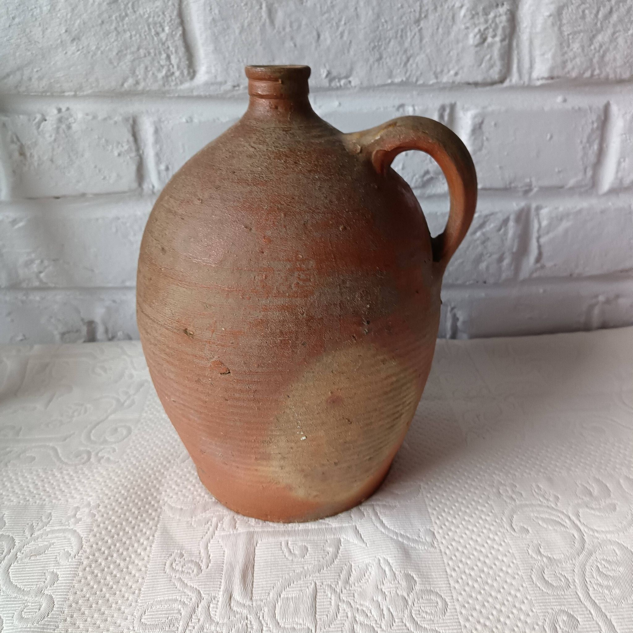 Old beige-brown stoneware jar France