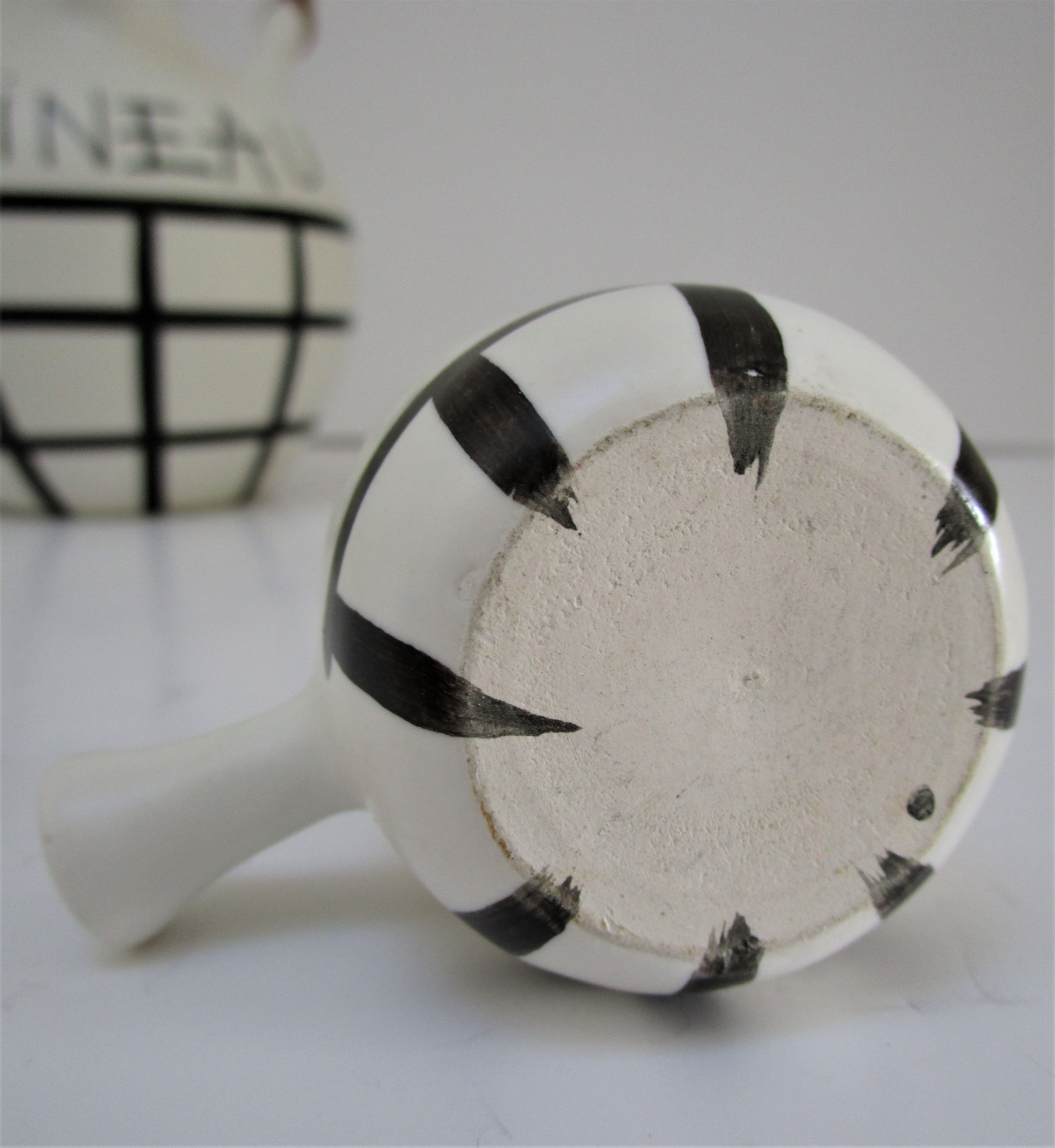 pineau bottle and ceramic cup by Lili Voltz 60s